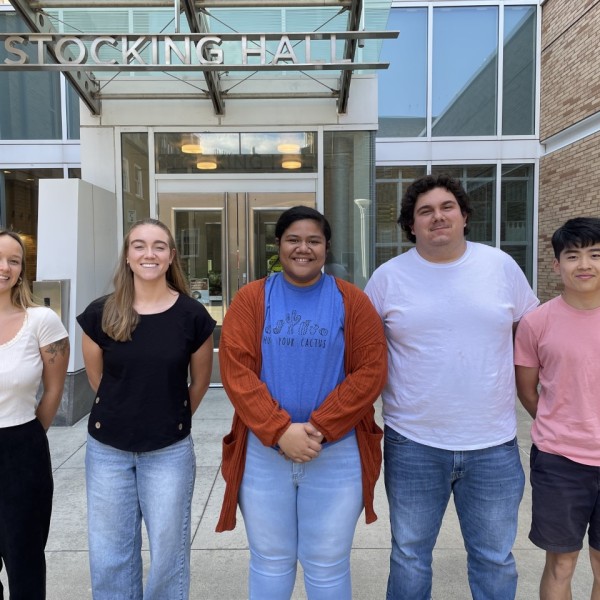 The 2021 sustainable ag intern cohort poses outside Stocking Hall.