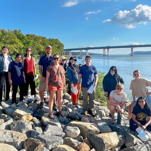 Students in the Climate-adaptive Design studio, a class in the Department of Landscape Architecture, take a break from their research survey last fall at Tarrytown, New York in front of the Gov. Mario M. Cuomo Bridge – which spans the Hudson River. 