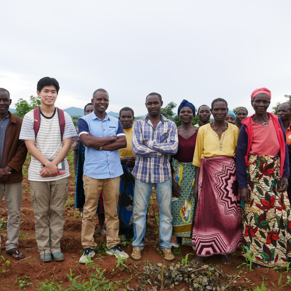 Group takes photo on a farm