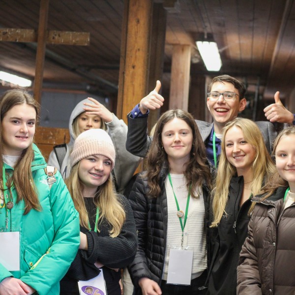 Group of high school students in a barn
