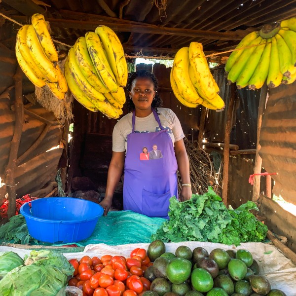 woman in fruit and vegetable stand