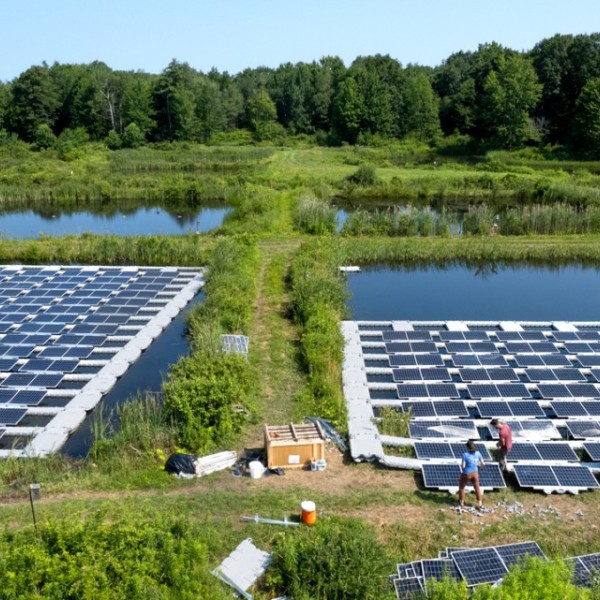 Researchers place solar panels on the Cornell Experimental ponds