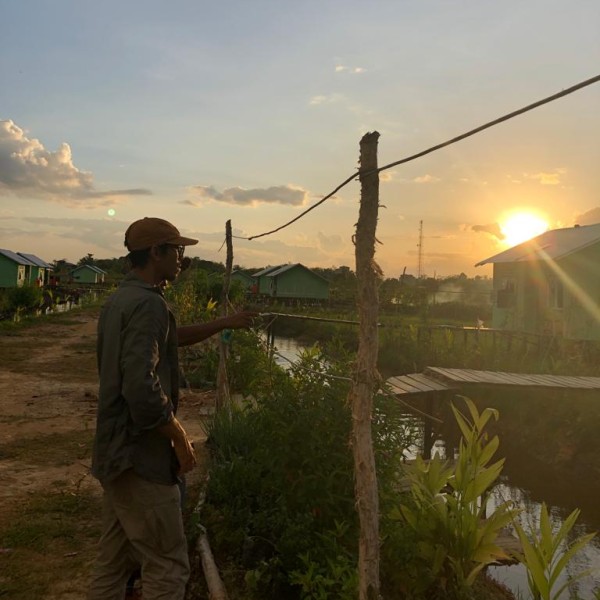 Man stands in field