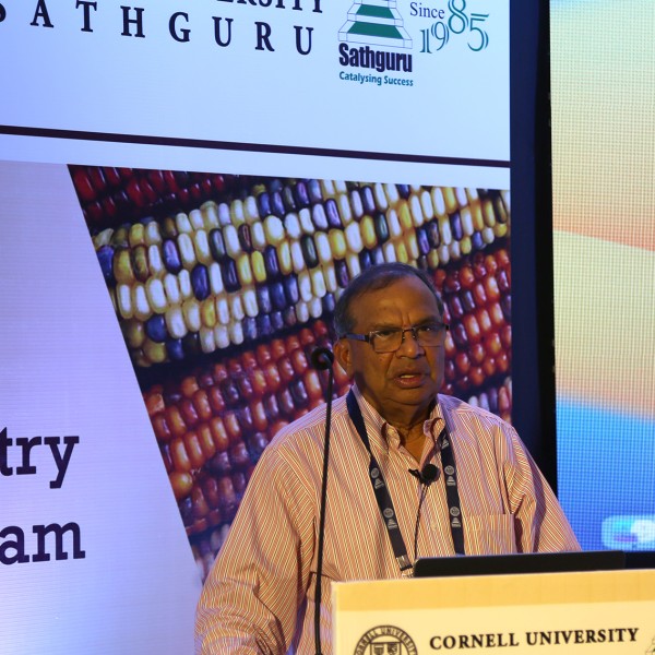 KV Raman speaking at podium