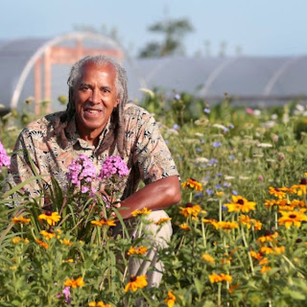 Jim Embry in field of flowers