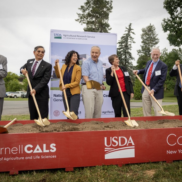 Officials break ground for the National Grape Improvement Center on June 26 at the Cornell AgriTech campus in Geneva, New York. From left: David Schulenberg, chief of staff for the U.S. Army Corps of Engineers Planning Branch; Simon Liu, administrator of the USDA Agricultural Research Service; Xochitl Torres Small, USDA deputy secretary; U.S. Senate Majority Leader Charles Schumer (D-New York); Christine Smart, Goichman Family Director of Cornell AgriTech and associate dean of CALS; Cornell University Provo