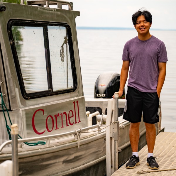  Logan Lee aboard a Cornell Biological Field Station boat