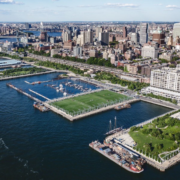 An aerial view of a city scape along water
