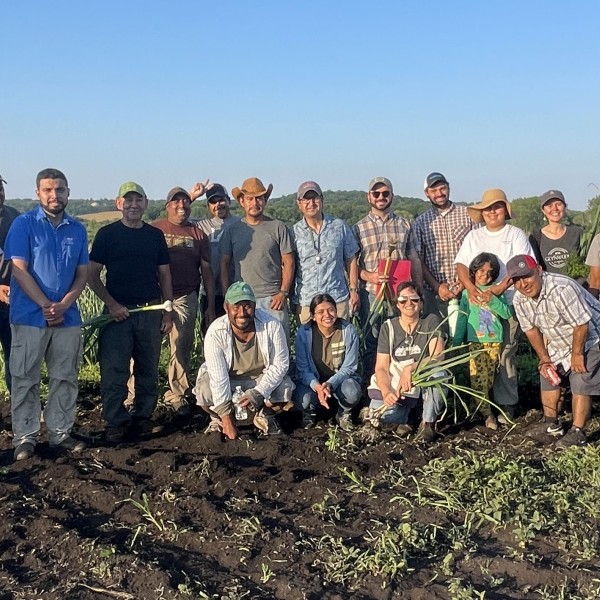 Students with Spanish-speaking farmers in Orange County.