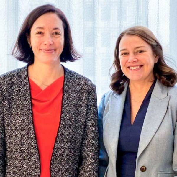 Beth McGinty, chief of the Division of Health Policy and Economics in the Department of Population Health Sciences at Weill Cornell Medicine, and Colleen Barry, founding dean of the Jeb E. Brooks School of Public Policy, celebrate the Cornell Health Policy Center's launch during an event Nov. 15 at Weill Cornell Medicine in New York City. Photo by Sudeepa Singh.