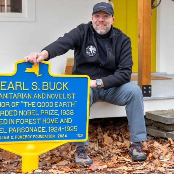 Thomas J. Campanella, MLA ’91, professor in the Department of City and Regional Planning in the College of Architecture, Art and Planning, spearheaded the effort to commemorate Pearl S. Buck’s first residency in Ithaca with a New York State Historic Marker, funded by the Pomeroy Foundation. He offered a preview of the marker prior to its Dec. 8 installation near Forest Home Chapel. Photo by Ryan Young.