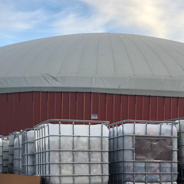 anaerobic digester with pallets in front