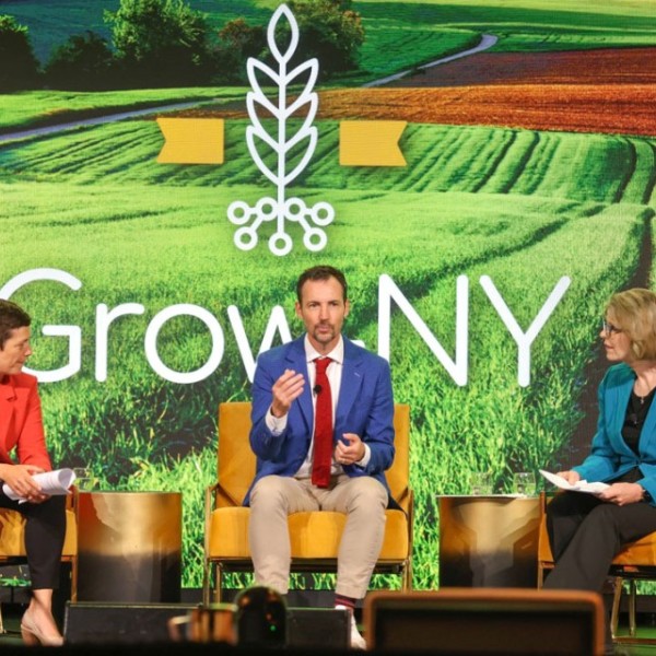 Benjamin Z. Houlton, center, the Ronald P. Lynch Dean of the College of Agriculture and Life Sciences, discusses net-zero dairy with Catharine Young, right, executive director of the New York State Center of Excellence for Food and Agriculture, and Saharah Moon Chapotin, executive director of the Foundation for Food & Agriculture Research, at the 2024 Grow-NY Summit in Ithaca.