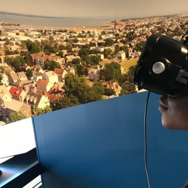 A participant immersing themselves in Black Spaces Matter, a traveling exhibition curated by Pamela Karimi that explores the historical post-industrial city of New Bedford (2017–2019).