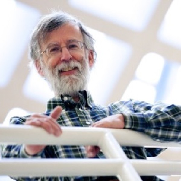Andy Clark leaning on a white railing