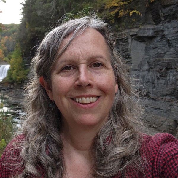 Joellen Lampman in front of a river