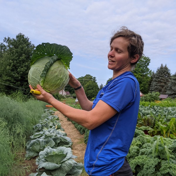 Flip Filippi proudly displaying a cabbage