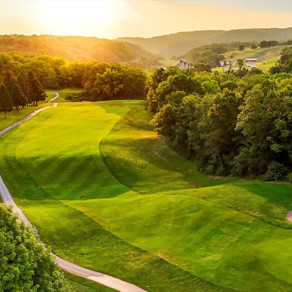 aerial view of fairway with rising sun