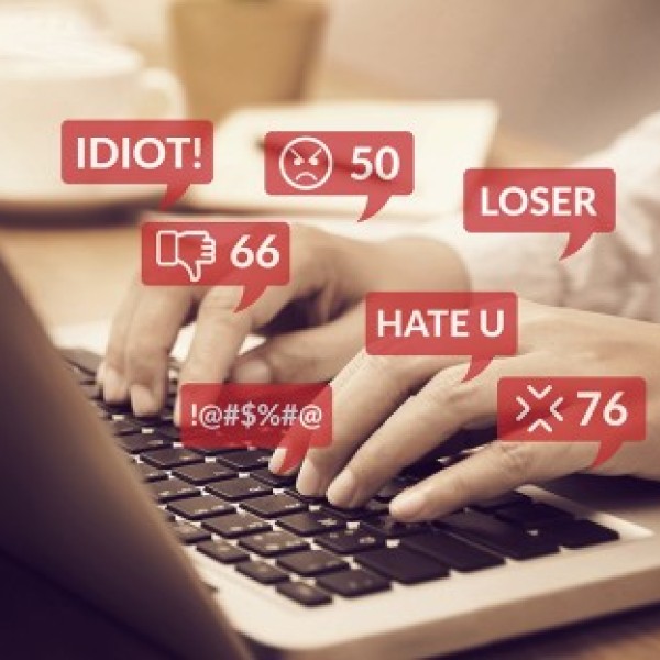 Person typing on keyboard