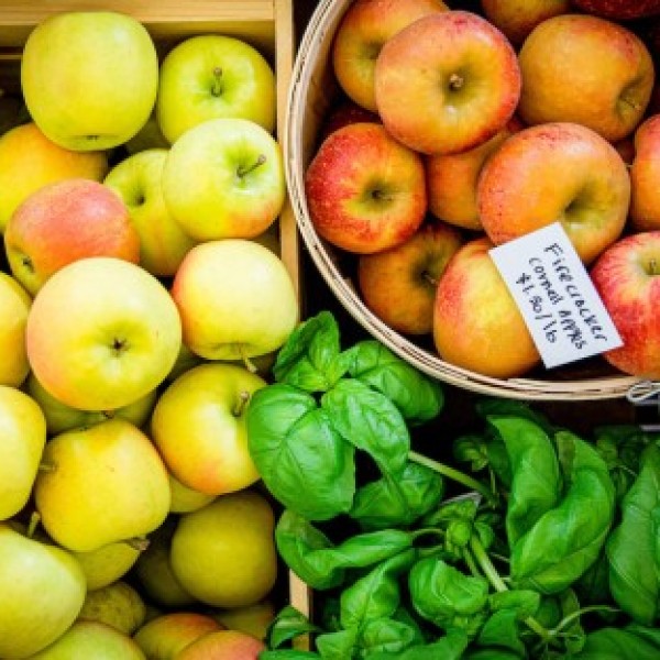 An assortment of apples and other produce