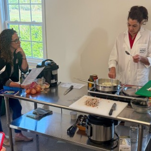 Extension support specialist Cynthia James leads a cooking demonstration
