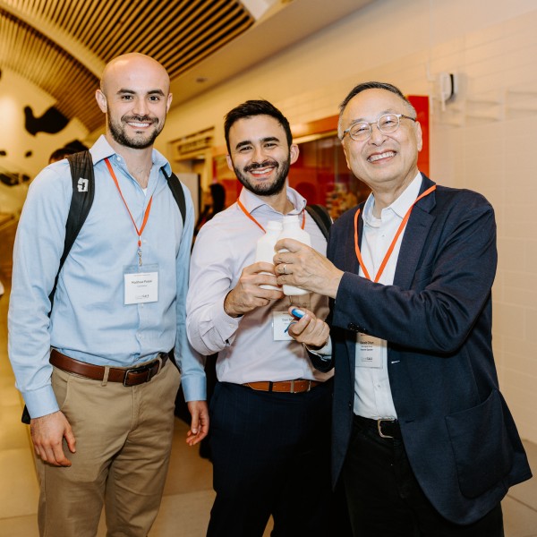 Gerald Chan poses with two attendees of CALS Innovation Day