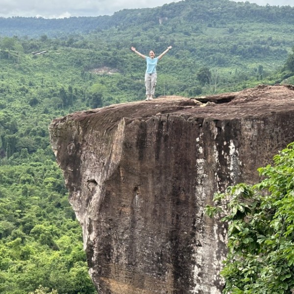 Emma Alexander standing on top of Phnom Kulen Mountain