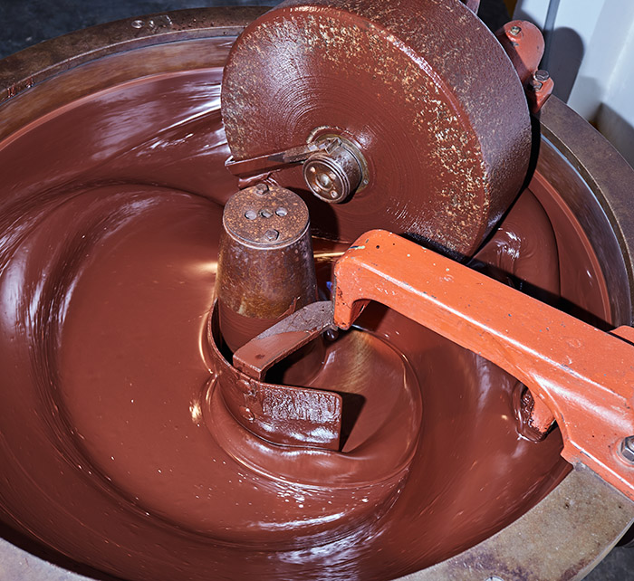 process of conching and refining chocolate in artisan small machine